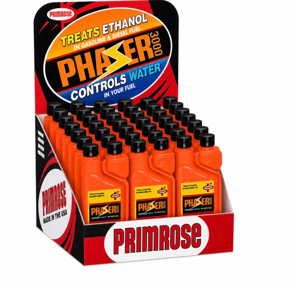 A retail display box filled with Primrose Phaser 3000 ethanol control bottles. The display features multiple bright orange plastic bottles with black caps, arranged in rows inside a branded red, black, and white cardboard counter display.