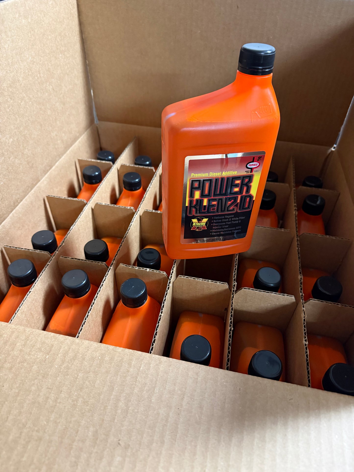 Primrose 5007 Premium Diesel Fuel Additive case of quarts bottles with label, designed to improve diesel engine performance and fuel efficiency. Diesel fuel additive, injector cleaner and cetane booster for diesel engines.